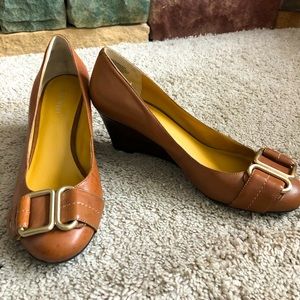 Nine West size 7 brown leather wedge heels.